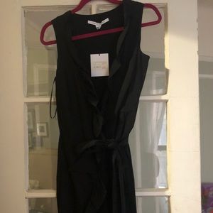 DVF brand new never worn black wrap dress.